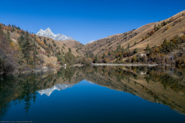 Mountains reflection in lake. China