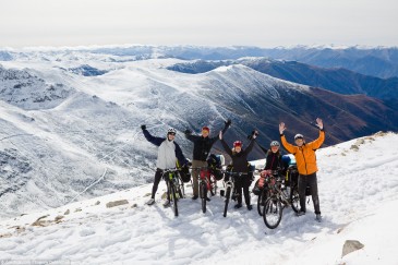 Cyclists at snowy pass in Pontic Mountains, Turkey