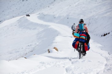 Cyclist on snowy road in Kachkar Mountains. Turkey