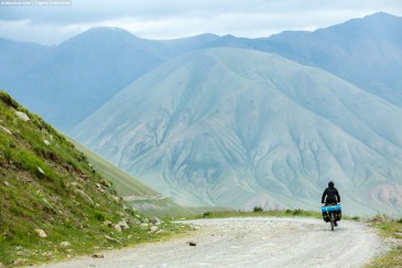 Cyclist in wonderful Tien Shan Mountains