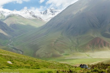 Tent and traveller in Tien Shan mountains